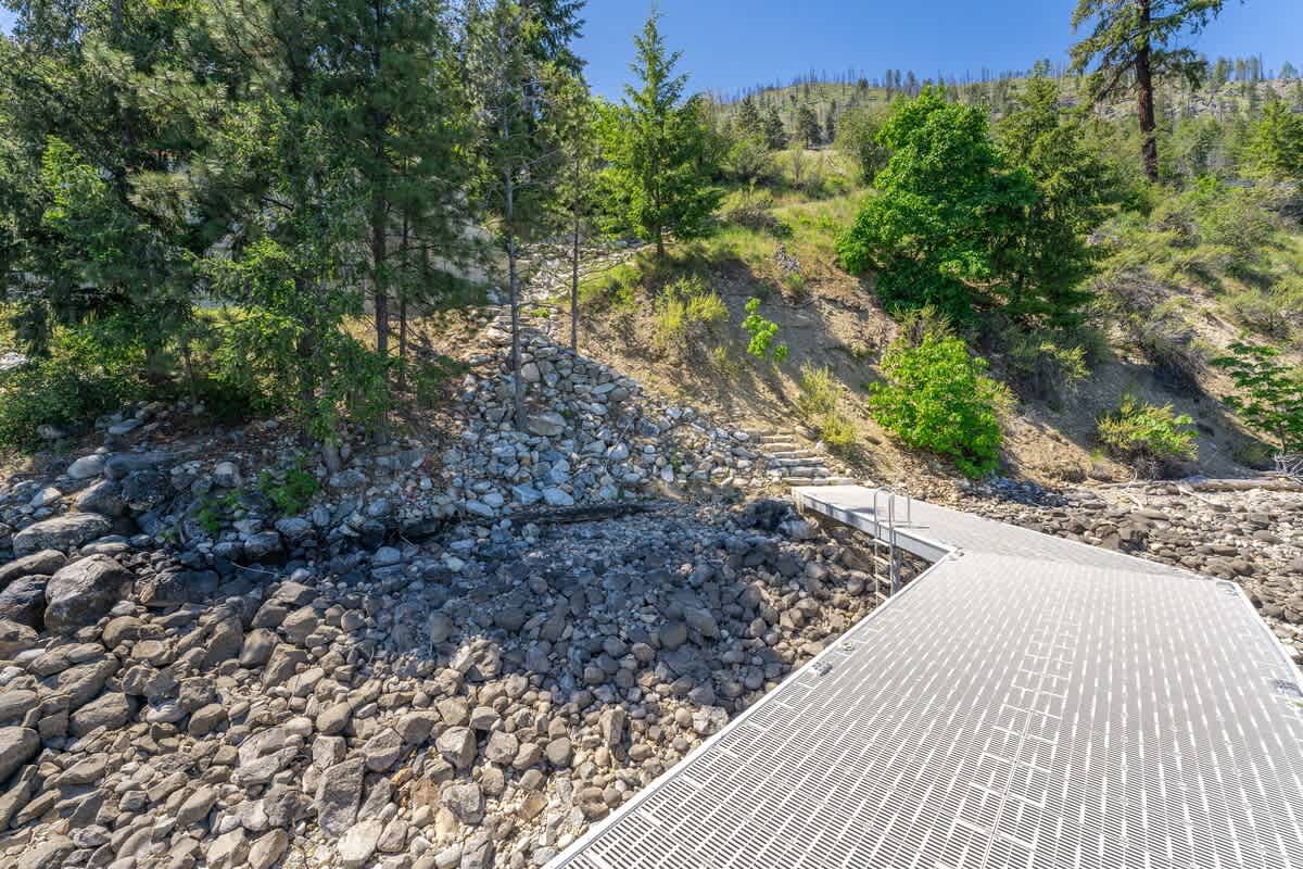 Steps / trail down to the private dock.