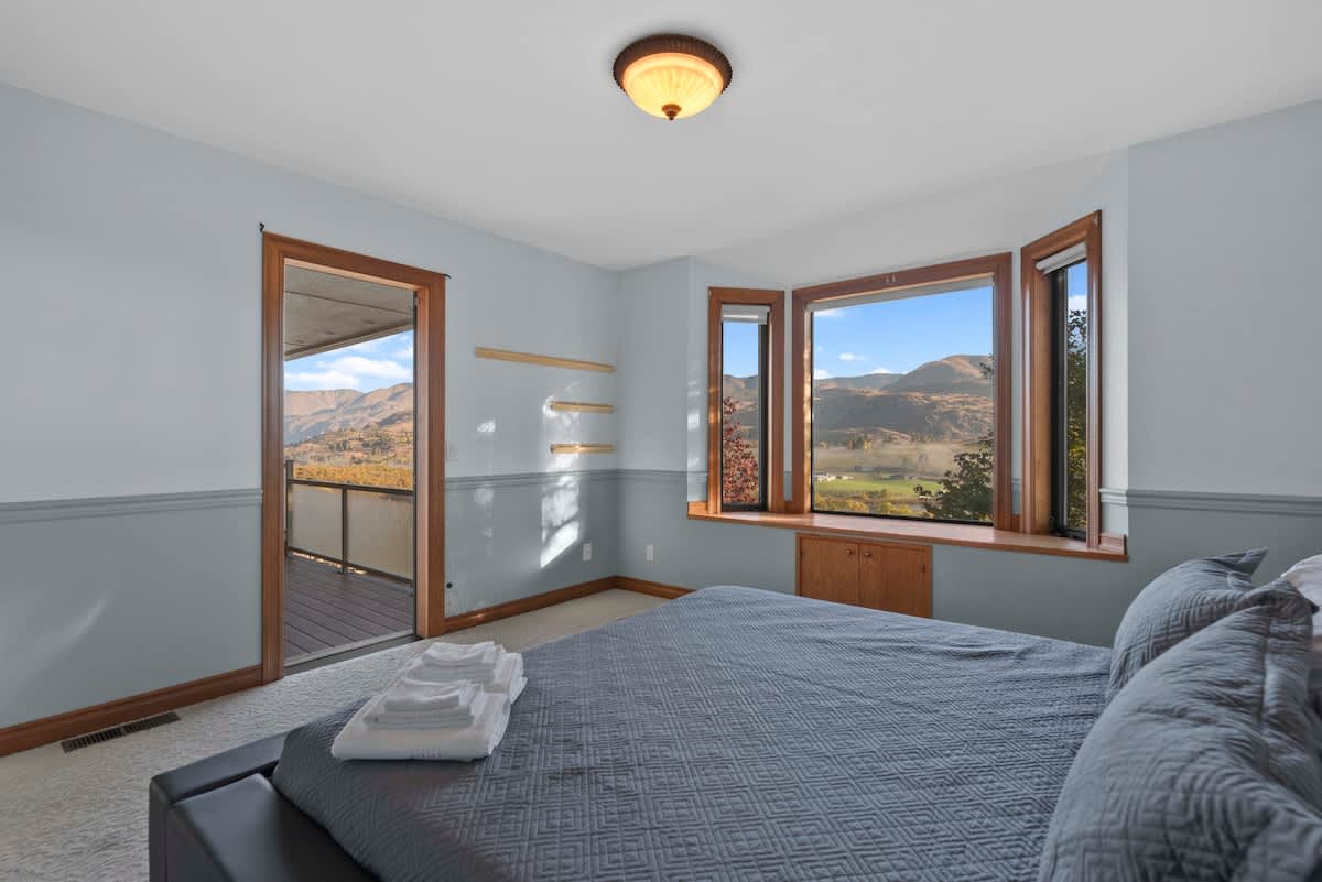 Bedroom with main level deck access